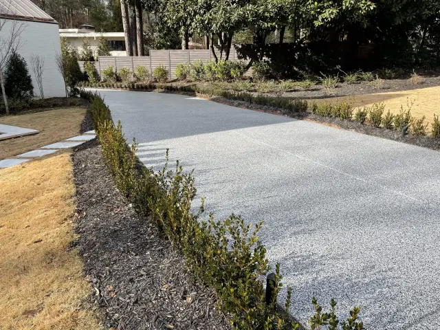 A long flake epoxy driveway by Garage Flooring Pros