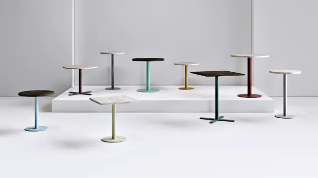 A collection of Special T tables in different finishes
