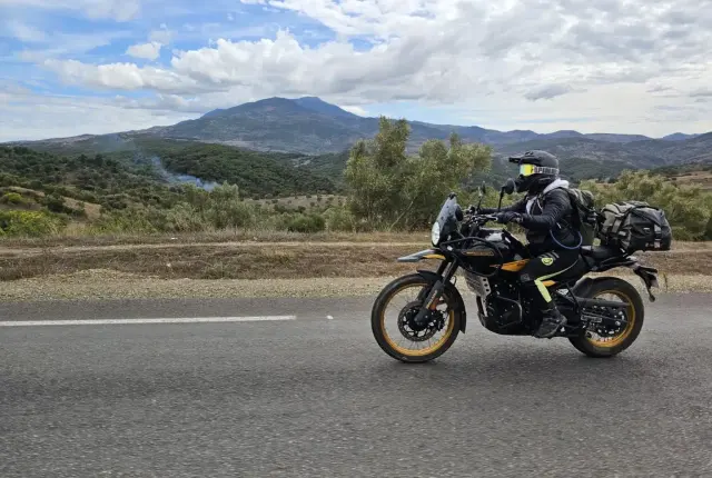 A WeRoam rider on a mountain road